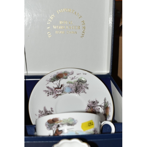 454 - A GROUP OF WEDGWOOD BLUE JASPERWARE AND OTHER CERAMICS, a boxed Royal Worcester 'Game Shooting' cup ... 