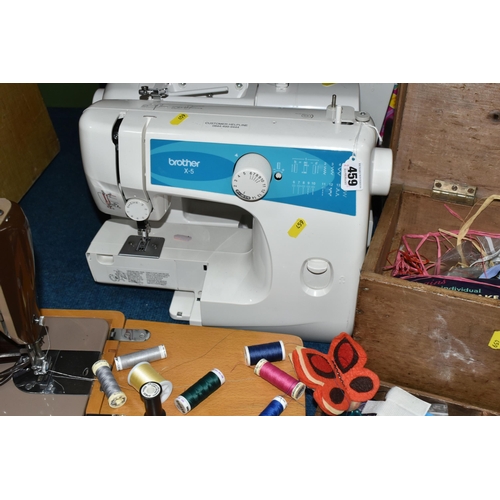 459 - THREE SEWING MACHINES AND SEWING/HABERDASHERY ITEMS, to include a vintage electric Singer sewing mac... 