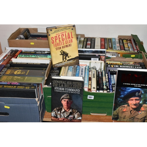 501 - FOUR BOXES OF MILITARY THEMED BOOKS AND MAGAZINES, over one hundred titles in hardback and paperback... 