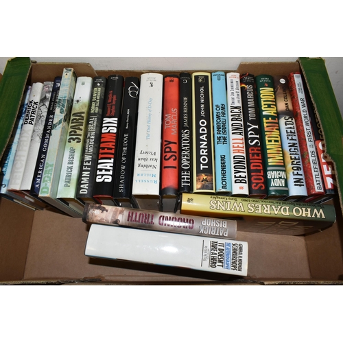 501 - FOUR BOXES OF MILITARY THEMED BOOKS AND MAGAZINES, over one hundred titles in hardback and paperback... 