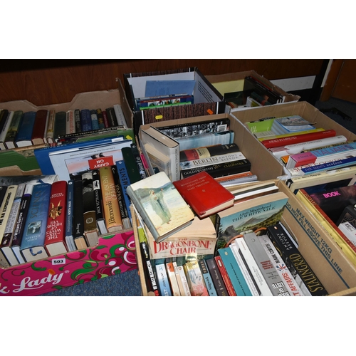 503 - EIGHT BOXES OF BOOKS, approximately one hundred and thirty titles in hardback and paperback formats ... 