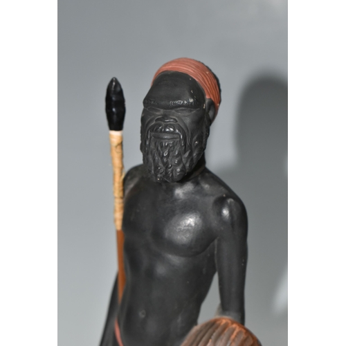 510 - AN AUSTRALIAN MID-CENTURY PIETER VAN DER HELDER ABORIGINAL FIGURE, a slip cast ceramic figure of a m... 