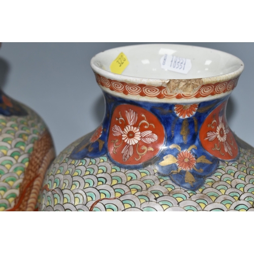 511 - A PAIR OF LATE 19TH CENTURY / EARLY 20TH CENTURY JAPANESE IMARI PORCELAIN BALUSTER VASES, the body w... 