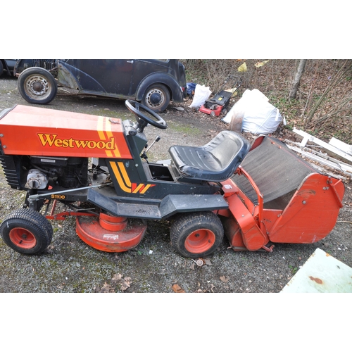 A VINTAGE WESTWOOD S1100 RIDE ON LAWN MOWER with grass collection box and one key battery flat tri