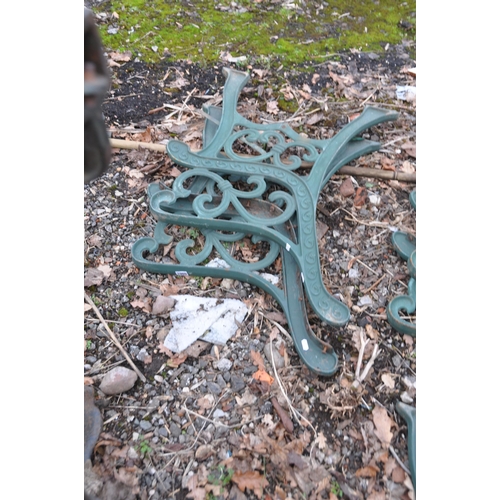 1009 - THREE PAIRS OF MODERN CAST IRON BENCH ENDS with green paint scrolled detail