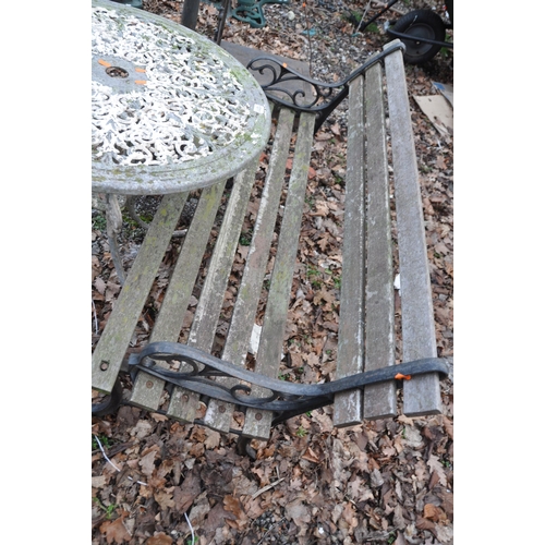 1011 - A MODERN ALUMINIUM CIRCULAR GARDEN TABLE, a modern bench with cast iron ends 122cm wide and two cast... 