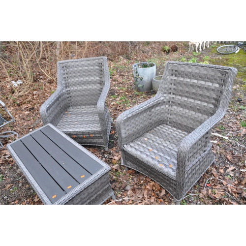 1012 - A MODERN GREY RATTAN EFFECT CONSERVATORY SUITE consisting of a three seat sofa, two chairs and a cof... 