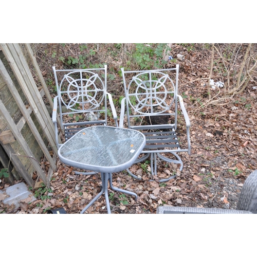 1013 - A PAIR OF MODERN ALUMINIUM SWIVEL GARDEN CHAIRS and a similar rectangular glass topped table (3)