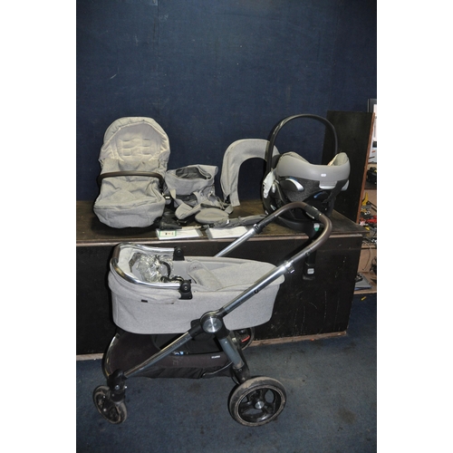 1051 - A MAMAS AND PAPAS SIGNATURE PUSH CHAIR SYSTEM with different parts for baby ages and a Cybex car sea... 