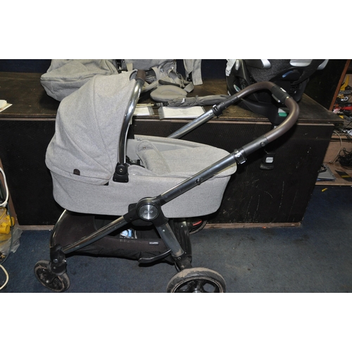 1051 - A MAMAS AND PAPAS SIGNATURE PUSH CHAIR SYSTEM with different parts for baby ages and a Cybex car sea... 