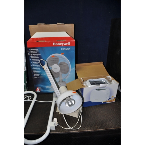 1055 - A COLLECTION OF HOUSEHOLD ELECTRICALS including a brand new in box Honeywell classic table fan, a br... 