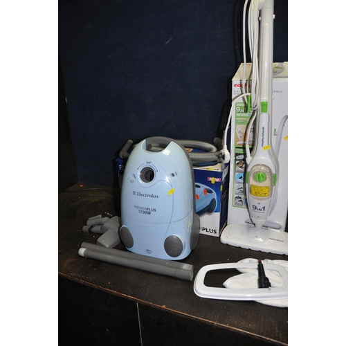 1088 - AN ELECTROLUX POWER PLUS 1700 VACUUM CLEANER with some accessories and original box, a Morphy Richar... 