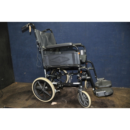 1110 - A REMPLOY FOLDING WHEELCHAIR with two footrests