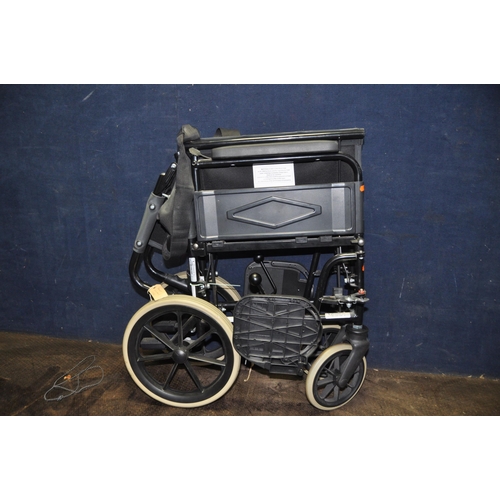 1110 - A REMPLOY FOLDING WHEELCHAIR with two footrests