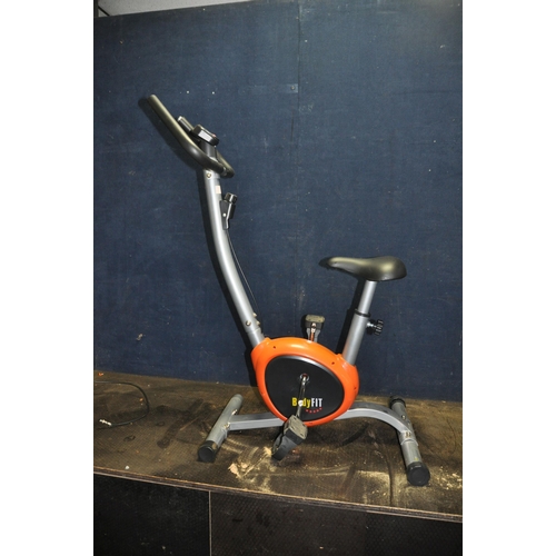 1115 - A BODY FIT EXERCISE BIKE with digital display