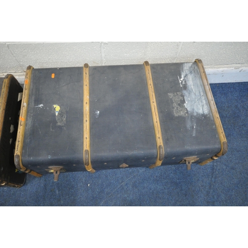 1201 - TWO VINTAGE CANVASS TRAVELING TRUNKS, with wooden banding, length 92cm x depth 54cm x height 32cm (c... 