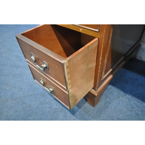 1203 - A 20TH CENTURY YEWWOOD TWIN PEDESTAL DESK, with a green tooled leather writing surface, fitted with ... 