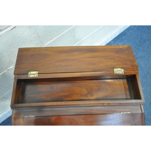 1204 - A REPRODUCTION VICTORIAN STYLE MAHOGANY DAVENPORT, with a small hinged compartment, a large hinged c... 