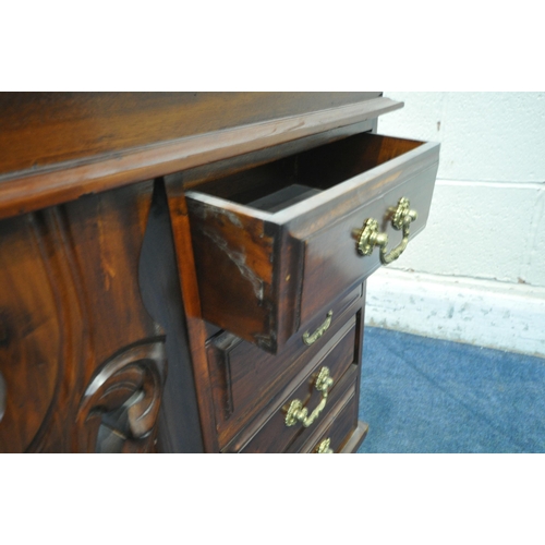 1204 - A REPRODUCTION VICTORIAN STYLE MAHOGANY DAVENPORT, with a small hinged compartment, a large hinged c... 