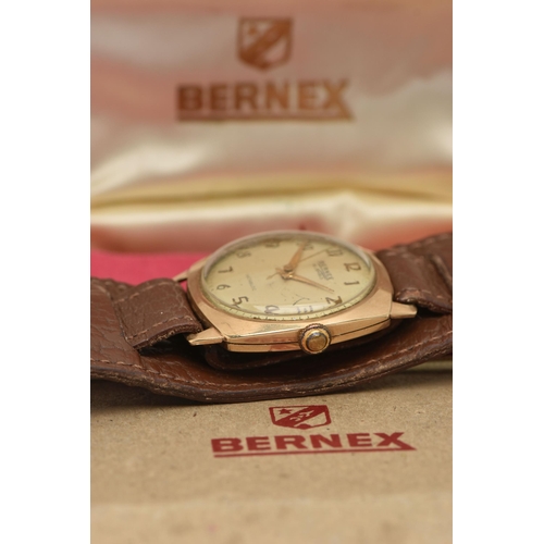 10 - A 9CT GOLD BERNEX WATCH, the gold coloured face with Arabic numerals, signed Bernex 18 Jewels Incabl... 