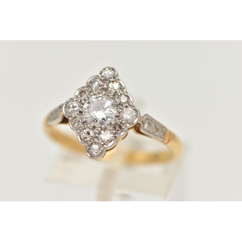 69 - A MID CENTURY DIAMOND CLUSTER RING, a principally set round brilliant cut diamond, approximate diamo... 