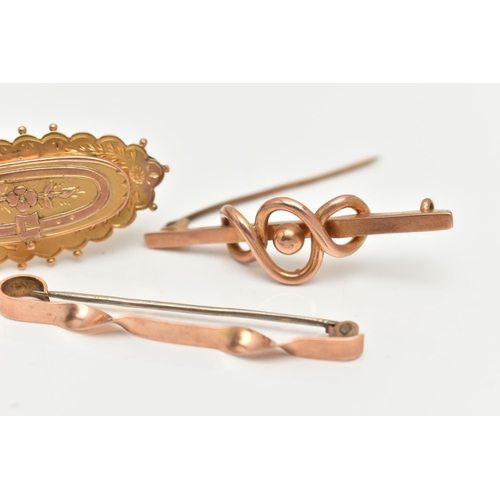 74 - THREE EARLY 20TH CENTURY BROOCHES, the first a 9ct gold knot style bar brooch, fitted with a base me... 