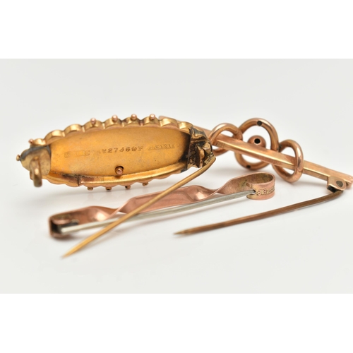 74 - THREE EARLY 20TH CENTURY BROOCHES, the first a 9ct gold knot style bar brooch, fitted with a base me... 