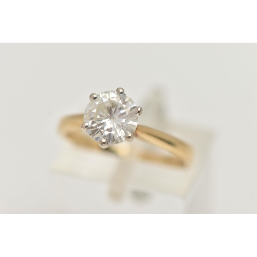 8 - A 9CT GOLD MOISSANITE RING, the brilliant cut moissanite in a six claw setting, with 9ct hallmark, r... 