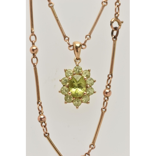 9 - A 9CT GOLD GEM CLUSTER PENDANT WITH CHAIN, the pendant designed as a central oval green gem, surroun... 