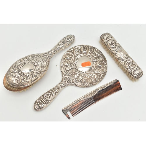 103 - A FOUR PIECE SILVER VANITY TABLE SET, comprising of a hair brush, clothes brush, hand held mirror an... 