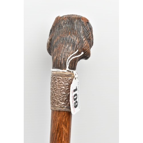 109 - A LATE VICTORIAN NOVELTY WALKING STICK WITH CARVED WOODEN DOG'S HEAD HANDLE, fitted with glass eyes,... 