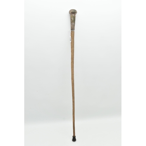 110 - A LATE 19TH CENTURY STINGRAY TAIL WALKING CANE WITH CHINESE WHITE METAL MOUNT, the mount engraved wi... 