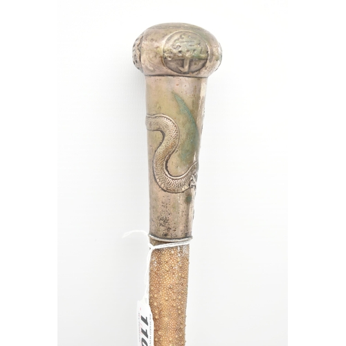 110 - A LATE 19TH CENTURY STINGRAY TAIL WALKING CANE WITH CHINESE WHITE METAL MOUNT, the mount engraved wi... 