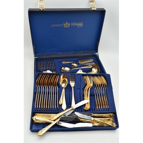 123 - A 'BESTECKE' CANTEEN OF CUTLERY, a blue case signed 'Bestecke Solingen', encasing a twelve person go... 