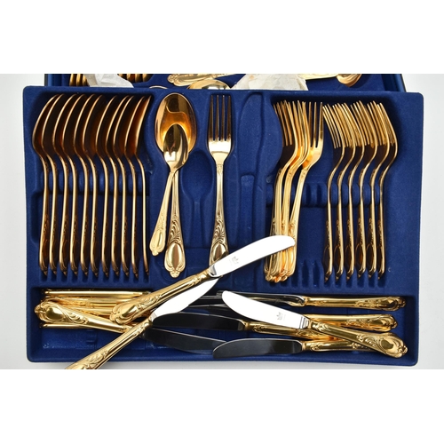 123 - A 'BESTECKE' CANTEEN OF CUTLERY, a blue case signed 'Bestecke Solingen', encasing a twelve person go... 