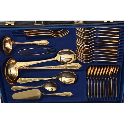 123 - A 'BESTECKE' CANTEEN OF CUTLERY, a blue case signed 'Bestecke Solingen', encasing a twelve person go... 