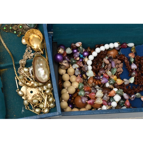 132 - TWO BOXES OF ASSORTED COSTUME JEWELLERY AND ITEMS, to include various beaded necklaces, imitation pe... 