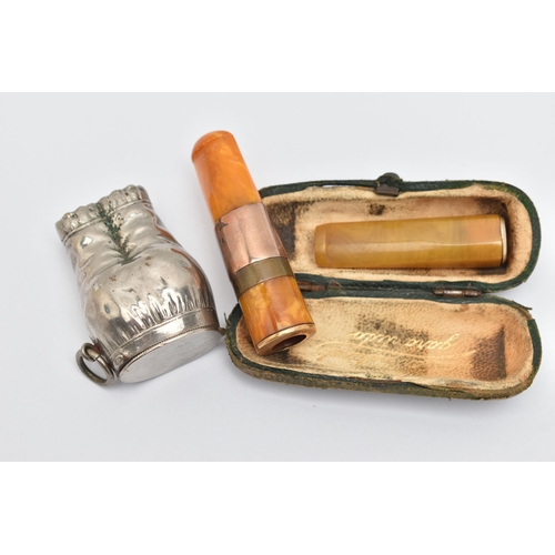 83 - TWO CHEROOTS AND A VESTA, the first an amber cheroot with a rose metal collar, together with case, t... 