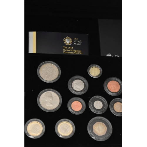 138 - A LARGE PLASTIC TUB TO INCLUDE MAINLY SILVER PROOF COINAGE A ROYAL MINT PREMIUM PROOF SET 2012, elev... 