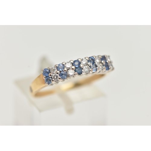 147 - A GEM SET RING, a double row of round brilliant cut diamonds and round cut blue sapphire, prong set ... 