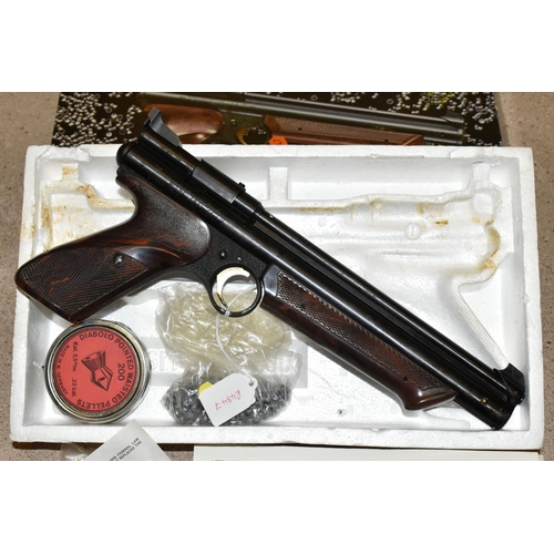 150 - A BOXED .22'' CROSMAN MODEL 300 MEDALLIST PUMP UP ACTION AIR PISTOL, serial no. 957782, it comes wit... 