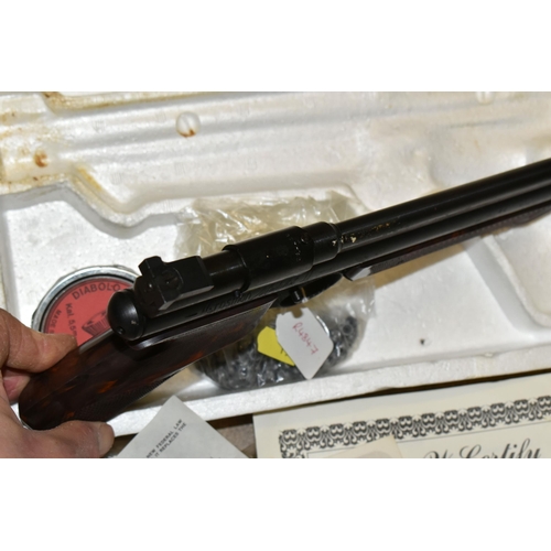 150 - A BOXED .22'' CROSMAN MODEL 300 MEDALLIST PUMP UP ACTION AIR PISTOL, serial no. 957782, it comes wit... 