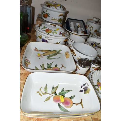 323 - A LARGE QUANTITY OF ROYAL WORCESTER 'EVESHAM' PATTERN DINNERWARE, comprising a 'Pot Du Creme' (handl... 