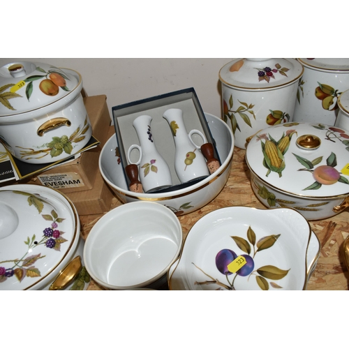 323 - A LARGE QUANTITY OF ROYAL WORCESTER 'EVESHAM' PATTERN DINNERWARE, comprising a 'Pot Du Creme' (handl... 