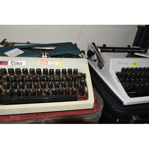 326 - SIX ROBOTRON 'ERIKA' TYPEWRITERS, mechanical model No.105 made in GDR, with carry cases (6 + 6 cases... 