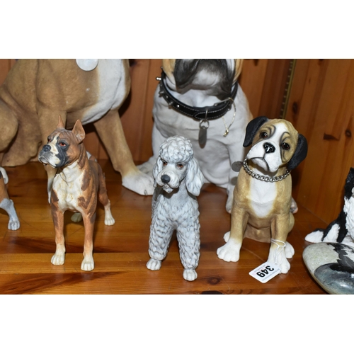 349 - A GROUP OF DOG ORNAMENTS, comprising a large 'Barkers' Alsatian 90399, height 41cm, a Country Artist... 