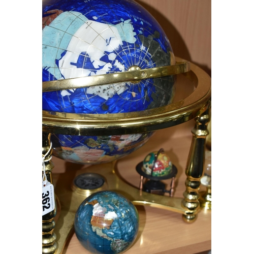 362 - A BLUE LAPIS GEMSTONE TABLE GLOBE, each continent of the globe is inlaid with various semi-precious ... 