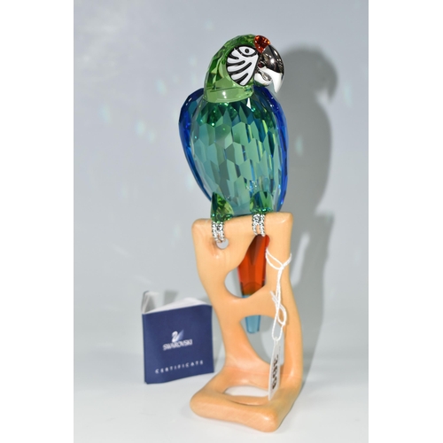 369 - A BOXED SWAROVSKI CRYSTAL BIRDS OF PARADISE 'MACAW CHROME GREEN' SCULPTURE, model no 685824, on a wo... 