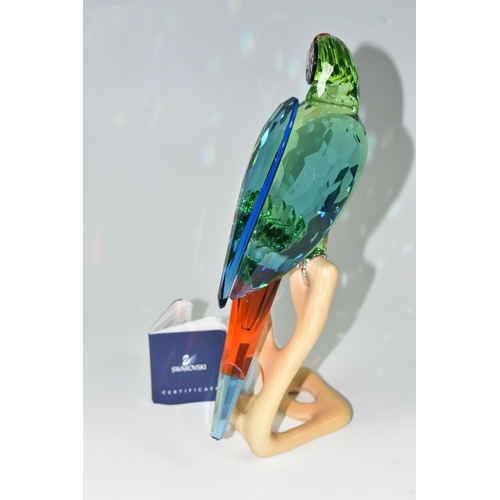 369 - A BOXED SWAROVSKI CRYSTAL BIRDS OF PARADISE 'MACAW CHROME GREEN' SCULPTURE, model no 685824, on a wo... 