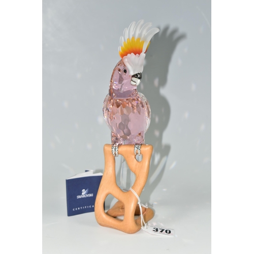 370 - A BOXED SWAROVSKI CRYSTAL BIRDS OF PARADISE 'COCKATOO RED' SCULPTURE, model no 718565, on a wooden s... 